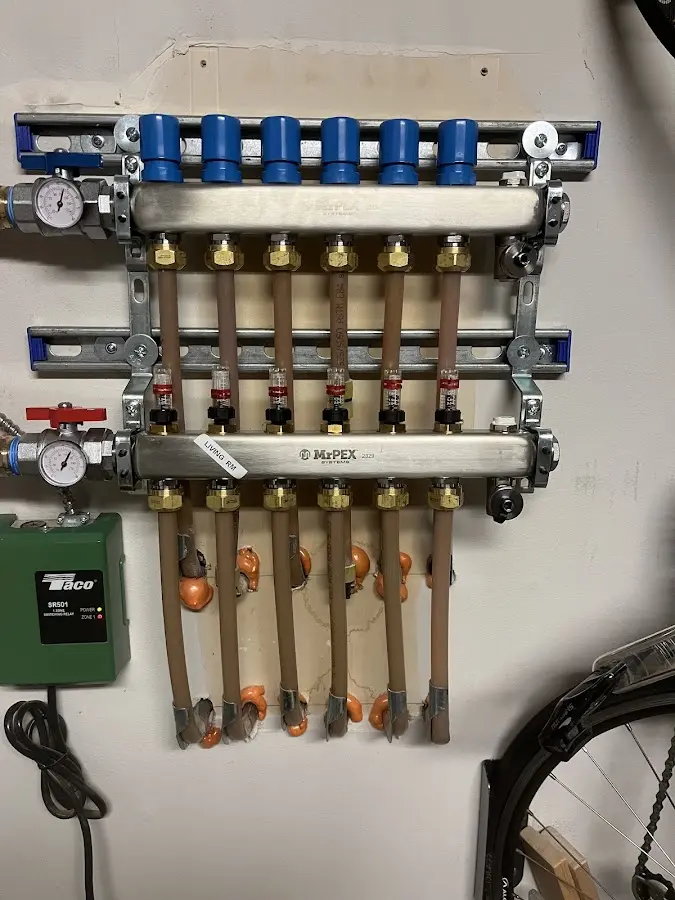 Plumber performing Gas Line Installation at a residential property in Cameron